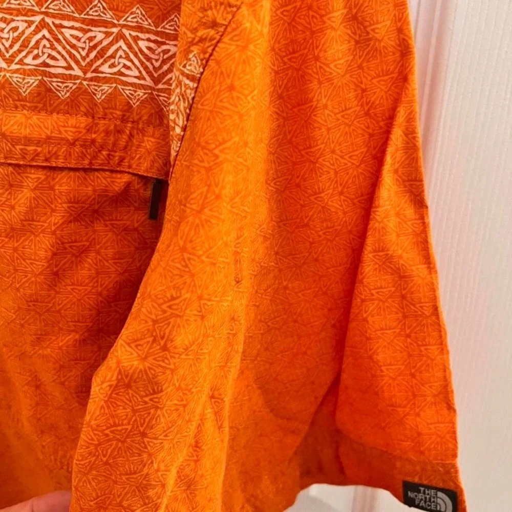 The North Face Orange button-up shirt with a boho vibe‎